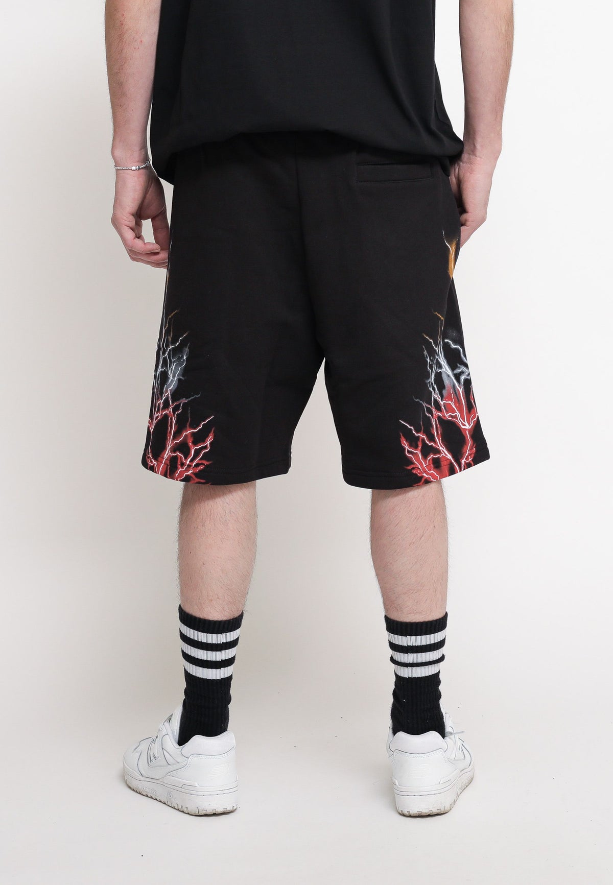 Black shorts with red, grey, and orange lightning. — 3